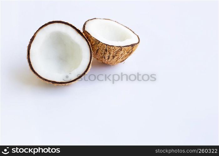 Ripe coconuts on white background. Copy space