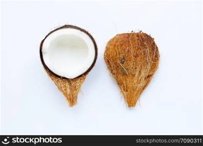 Ripe coconuts on white background. Top view of tropical fruit.