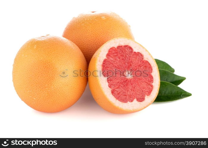 Ripe cut red grapefruit isolated on white background