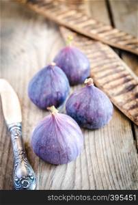 Ripe figs on the wooden table