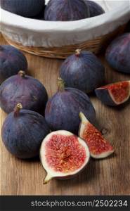 Ripe figs on wooden table