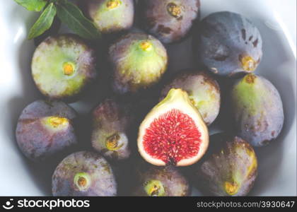 Ripe figs ready to eat a wooden table