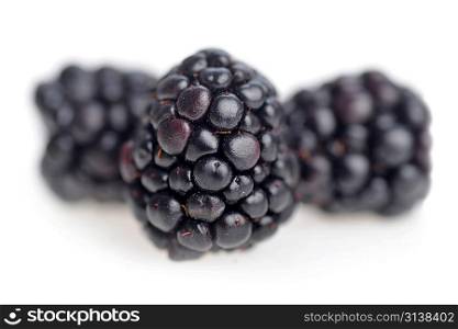 ripe fresh blackberries on white background