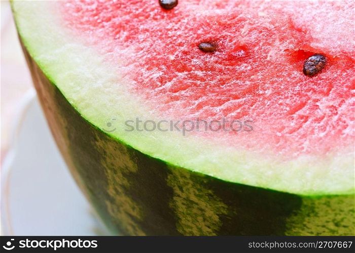 Ripe fresh water-mellon on a plate close-up