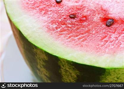 Ripe fresh water-mellon on a plate close-up
