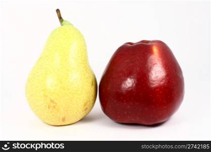 Ripe fresh yellow pear and red apple