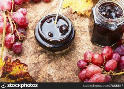 Ripe grapes and home made jam grape. Homemade berry jam