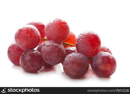 ripe grapes with water drops isolated