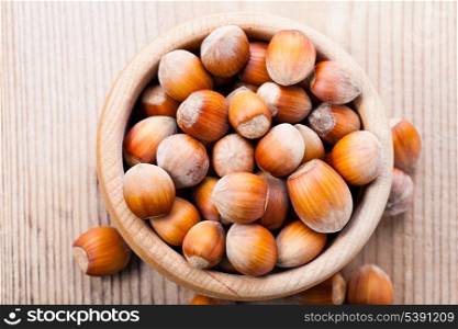 Ripe hazelnuts on the wooden table