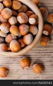 Ripe hazelnuts on the wooden table