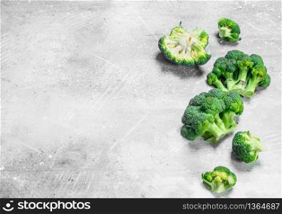 Ripe juicy broccoli. On rustic background. Ripe juicy broccoli.