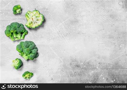 Ripe juicy broccoli. On rustic background. Ripe juicy broccoli.