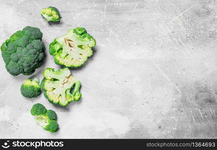 Ripe juicy broccoli. On rustic background. Ripe juicy broccoli.