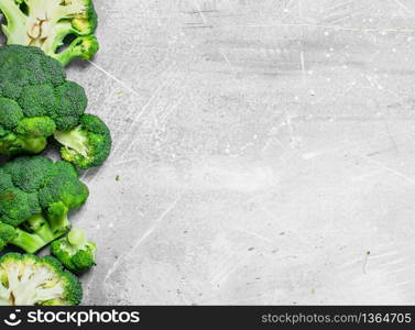 Ripe juicy broccoli. On rustic background. Ripe juicy broccoli.