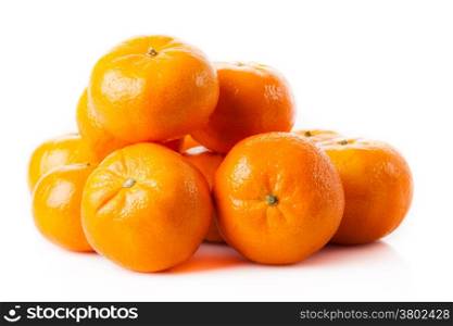 ripe juicy tangerine on a white background. Clementine Mandarin Oranges