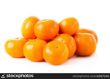 ripe juicy tangerine on a white background. Clementine Mandarin Oranges