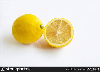 Ripe lemon on white background.