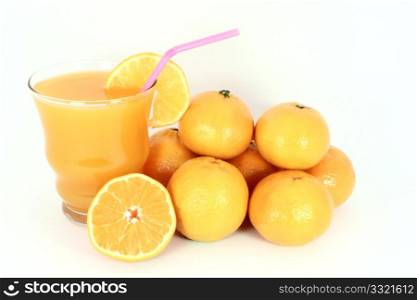 Ripe mandarines with fresh juice isolated on white