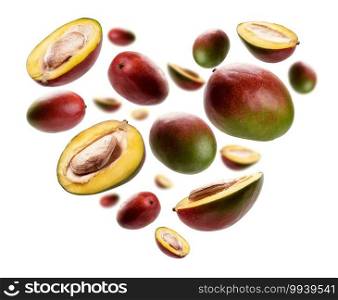Ripe mangoes in the shape of a heart on a white background.. Ripe mangoes in the shape of a heart on a white background