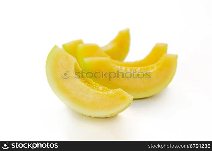 Ripe melon fruit. Ripe cantaloupe melon fruit on wooden background