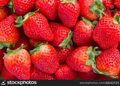 ripe of fresh red strawberry background close up