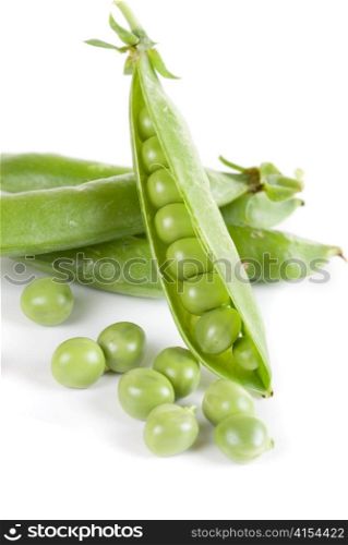 Ripe pea vegetable with green leaf isolated on white background