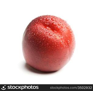 ripe peach with drops isolated on a white background