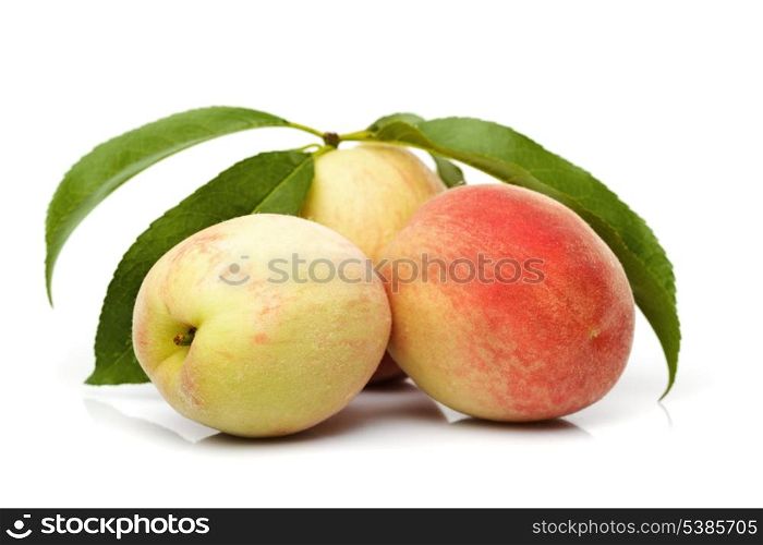 Ripe Peach with Leaf, isolated on White Background