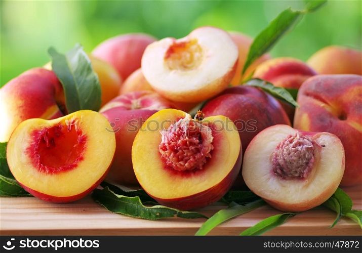 ripe peaches on table