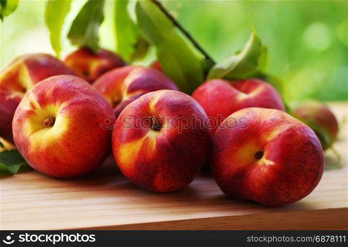 ripe peaches on table