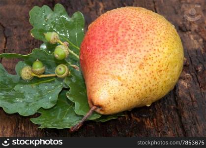 Ripe PEAR On the old wooden table top