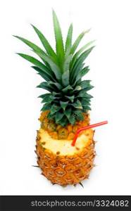 ripe pineapple cutted on top with red straw isolated on white background