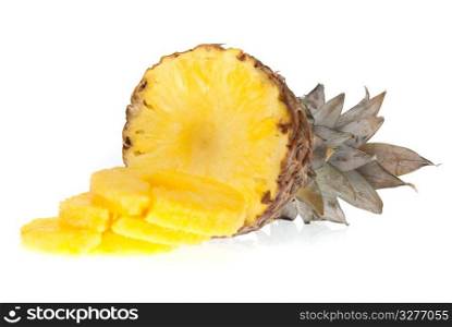 Ripe pineapple with slices isolated on white background.