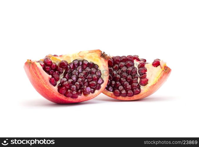 Ripe pomegranate fruit isolated on white background cutout&#xA;&#xA;