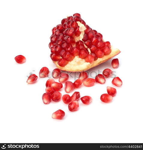 Ripe pomegranate piece isolated on white background