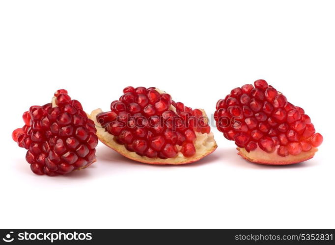 Ripe pomegranate piece isolated on white background