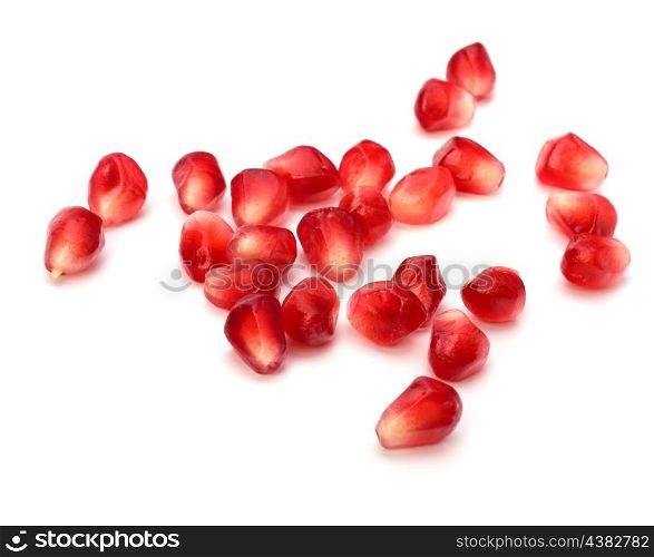 Ripe pomegranate seeds isolated on white background
