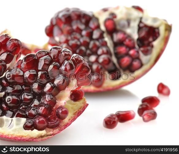 Ripe Pomegranate With Red Seeds On White Background ,Close Up