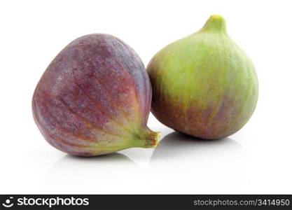 Ripe purple and green fig fruit isolated on white background