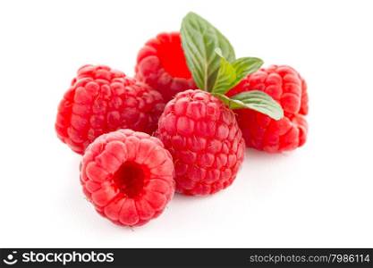 Ripe raspberry with leaf isolated on white background.