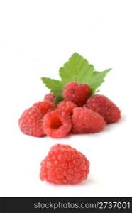 ripe red raspberries isolated on white background