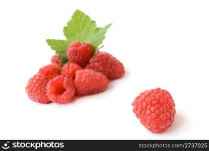ripe red raspberries isolated on white background