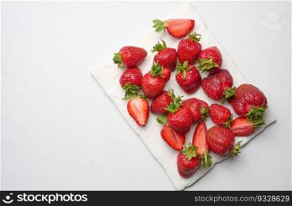 Ripe red strawberry on white background, top view