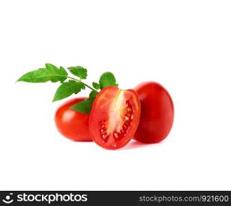 ripe red whole tomatoes and slices on a white background, autumn harvest for salad and cooking