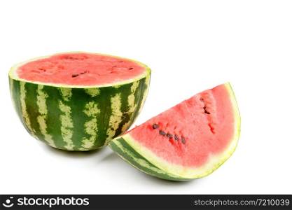 Ripe round watermelon and half a berry isolated on white background. Free space for text.