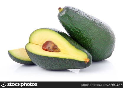 Ripe sliced avocado fruits isolated on white background