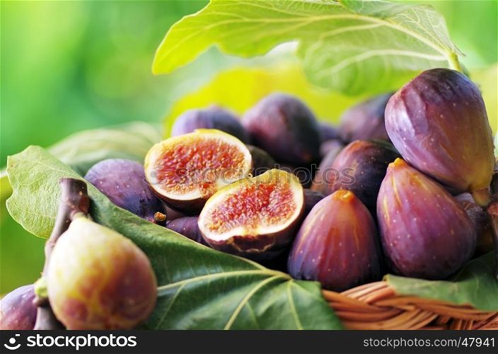 ripe slices of figs on basket
