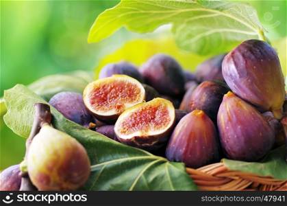 ripe slices of figs on basket