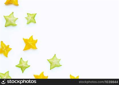 Ripe star fruit on white background. Copy space
