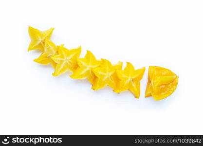 Ripe star fruit on white background. Top view